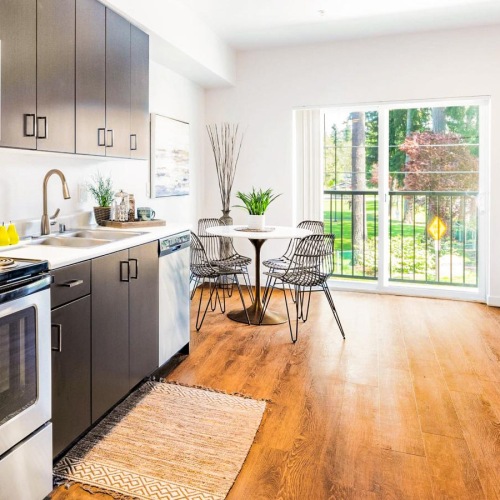 a kitchen with a wood floor