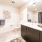 a bathroom with a large mirror
