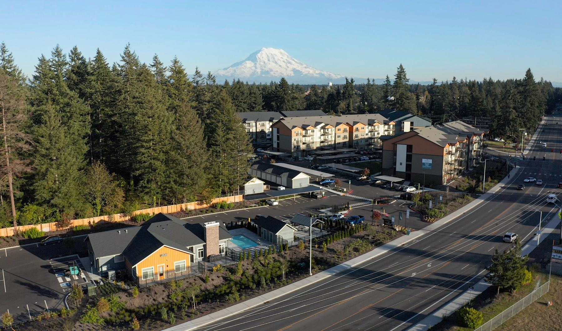The essence of exceptional living a town with a mountain in the background