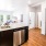 a kitchen with a washer and dryer