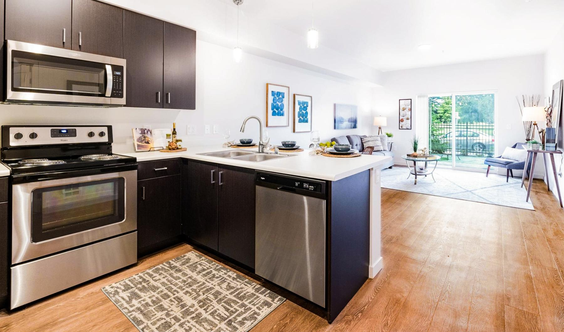Find your perfect fit at Wellstone a kitchen with black appliances