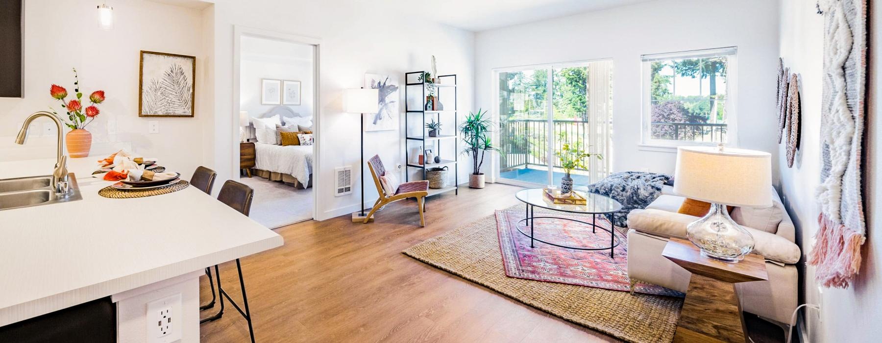 a living room with a bed and couch