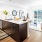 a kitchen with a couch and a table