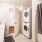 a room with a washing machine and a sink