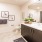 a bathroom with a large mirror
